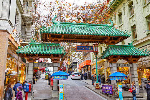 March 18, 2023: walking the Chinatown of San Francisco, California with Chinese lamps, stores, hotels, restaurants and traditional boutiques