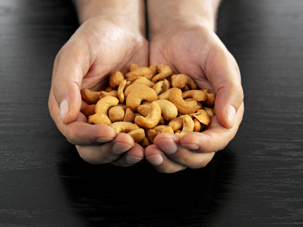 istock Handful of cashews 1126460955