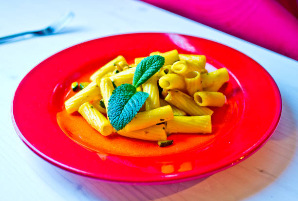 istock pasta seasoned with savory vegetable sauce, saffron and herbs 1126462426