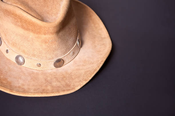 istock Brown cowboy hat on a black background 1126462604