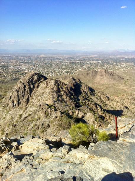 istock Phoenix subdivision in the desert from the surrounding mountains 1126462955