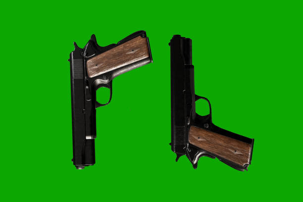 istock guns isolated on green background 1126463345
