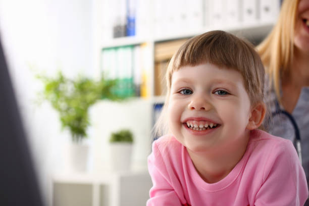 istock Little child at pediatrician reception 1126465235