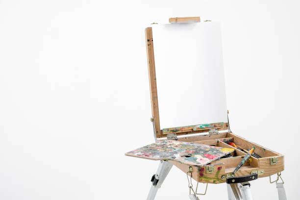 istock Artist easel with blank canvas on a white background. 1126471207