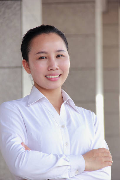 istock Smiling asian businesswoman 1126472111