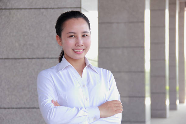istock Smiling asian businesswoman 1126472686