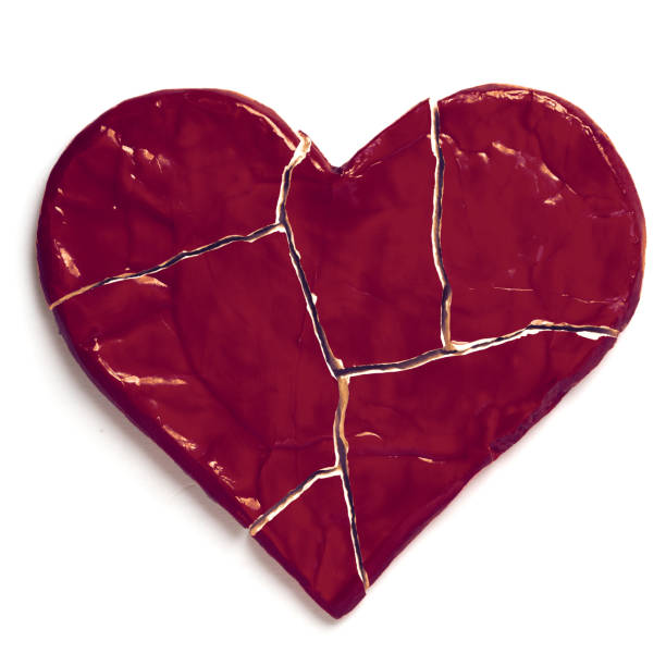 istock Red broken heart isolated on white background. Cut out 1126475952