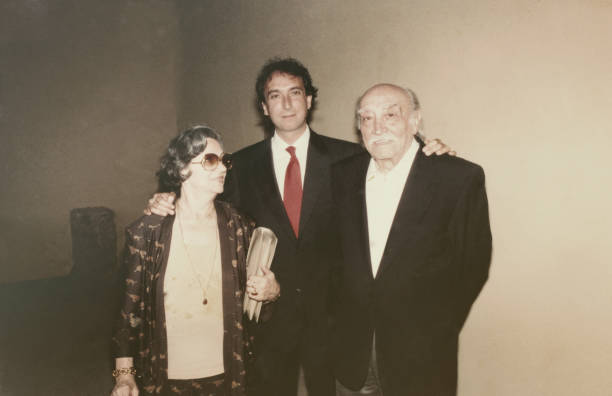 istock Young groom with his parents in 1968 1126476829