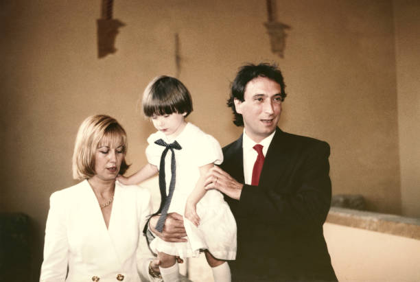 Young couple just married with their daughter in 1968