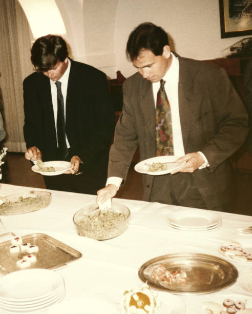 istock Two young man at wedding party in 1968 1126476841