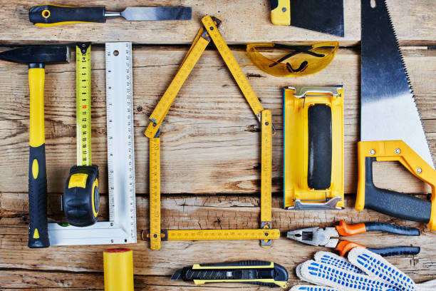 istock set of construction tools on a wooden background top view 1126477013