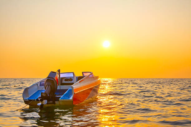 istock Sunset seascape with a motorboat 1126477107