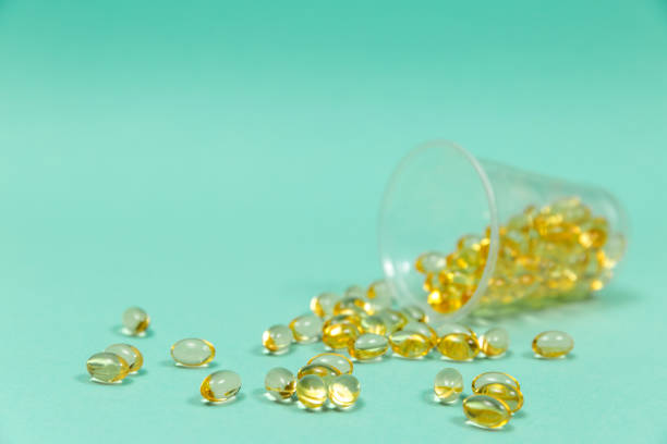 istock Cod liver oil omega 3 gel capsules with copy space 1126477484