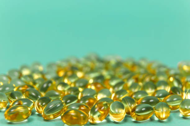 Cod liver oil omega 3 gel capsules with copy space
