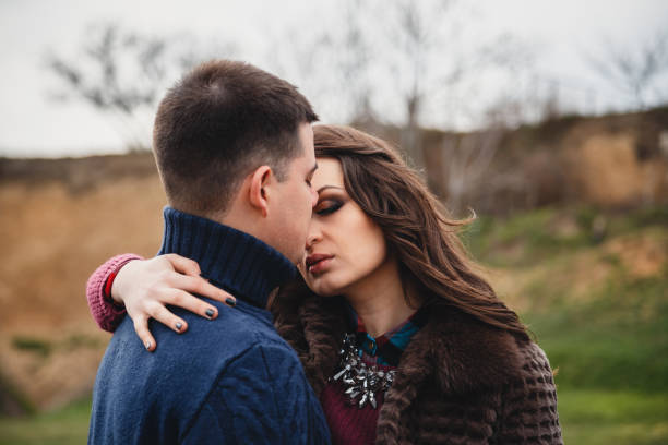 istock Close up of romantic attractive young couple hugging 1126477789
