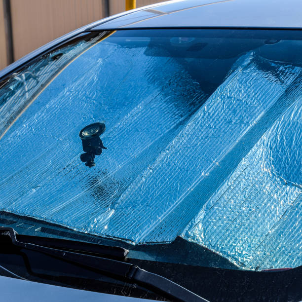 istock Protection of the car panel from direct sunlight. Sun Reflector windscreen 1126477945
