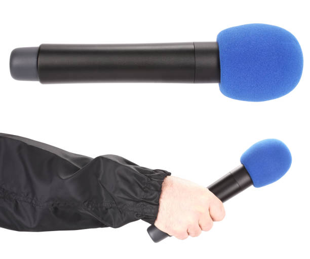 istock Journalist TV reporter show host hand hold red microphone for interview 1126478139