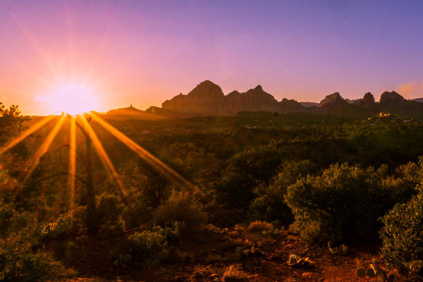 Sedona Sunset Landscape of Sedona with Sunset and sun star burst red rocks state park arizona photos stock pictures, royalty-free photos & images