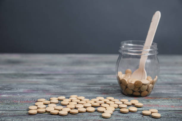 istock Alternative medicine tablets with a copy of space 1126481068