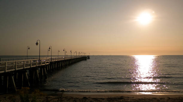 istock Sunrise over pier in Gdynia, Poland. 1126482892