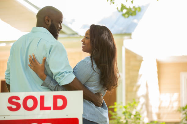 istock Couple moving into new home. 1126482945