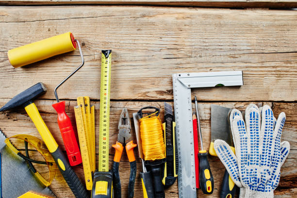 istock set of construction tools on a wooden background top view 1126483895