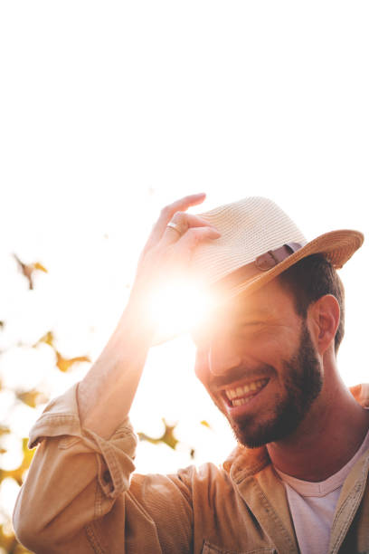 istock Smiling man with hat outdoors 1126485162