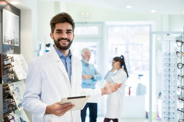 istock Young happy doctor checking results on the tablet 1126485328