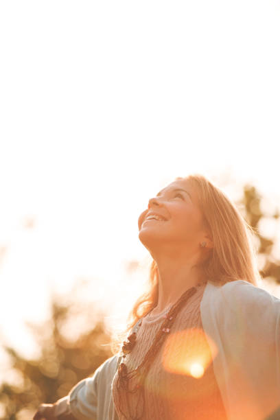 istock Woman enjoying sunny day 1126486034