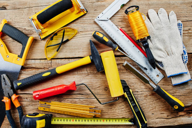 istock set of construction tools on a wooden background top view 1126487498