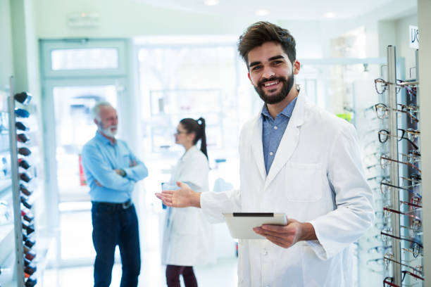istock Young medical worker in the optical shop 1126487674