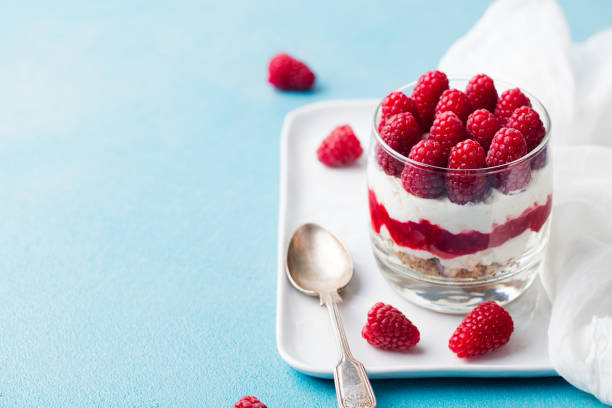 istock Raspberry dessert, cheesecake, trifle, mouse in a glass. Copy space. 1126488174