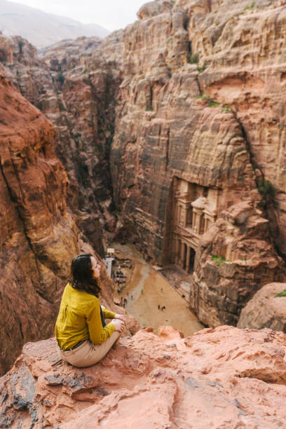 istock Woman looking at Al-Khazneh in Petra 1126488280