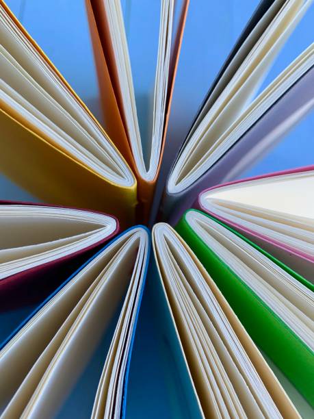 istock Circle of workbooks from above 1126491153