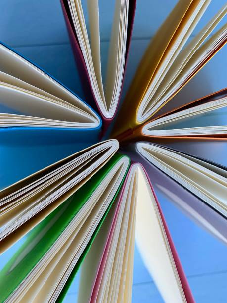 istock Circle of workbooks from above 1126491179
