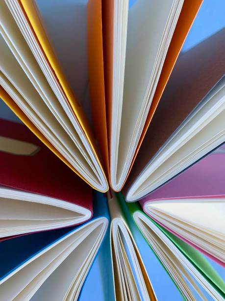 istock Circle of workbooks from above 1126491229