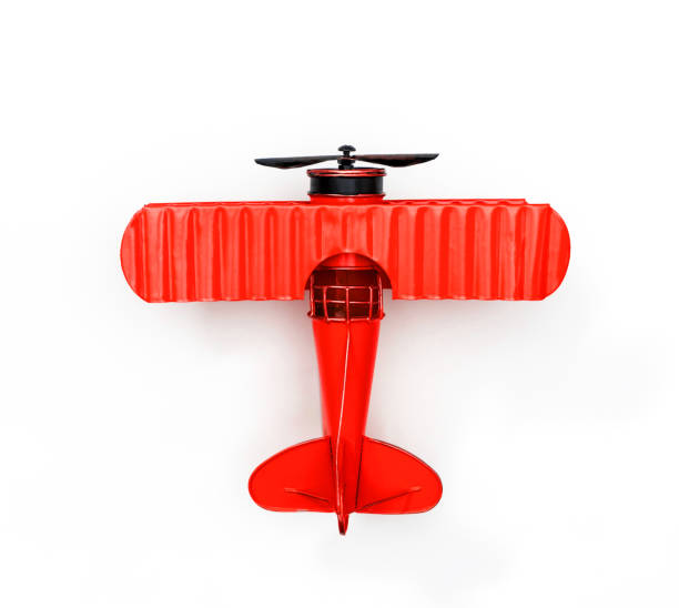 istock red Metal toy plane isolated on white 1126493021