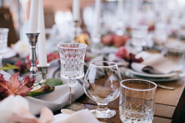 istock Elegant Wedding table set with pink wlowers and candlesticks 1126494516