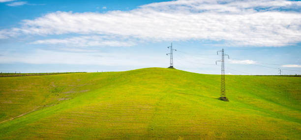 Telephone line in Tuscan farmland, Italy.