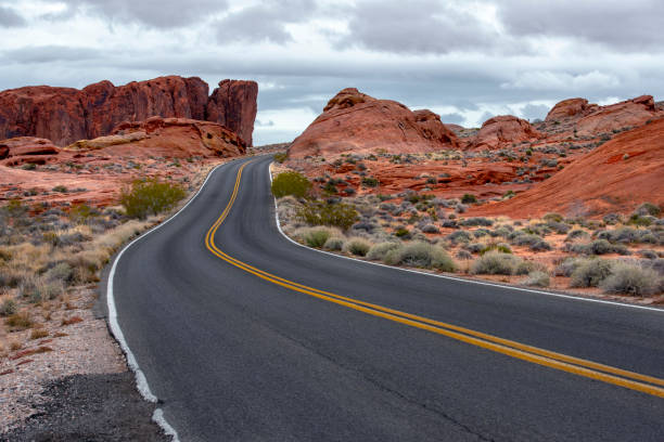 istock Empty Desert Road on Red Rock Canyon after storm 1126505864