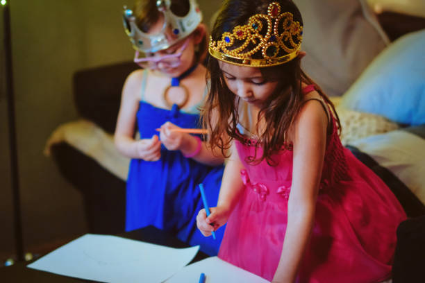 istock Cute Little Sisters Princess Drawing 1126509367