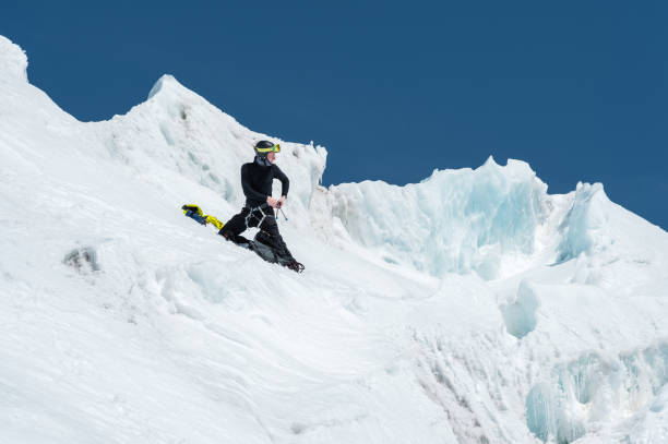 istock Mountain guide candidate training ice axe and rope skills on a glacier in the North Caucasus 1126509618