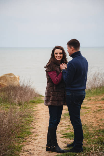 istock Romantic attractive young couple spending time together outdoors 1126509635