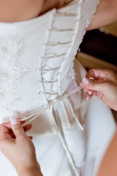 istock Preparing for the wedding and dressing the bride 1126510892