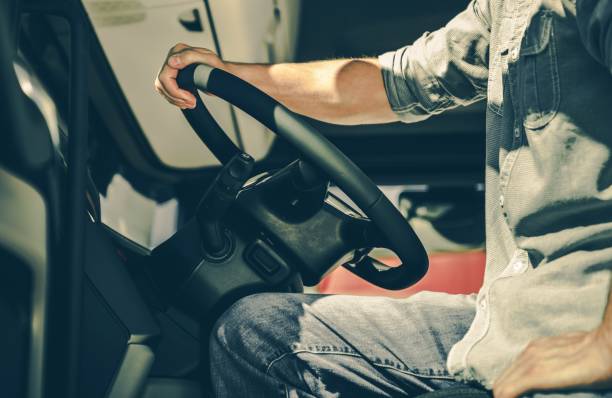 istock Truck Driver Behind the Wheel 1126512921