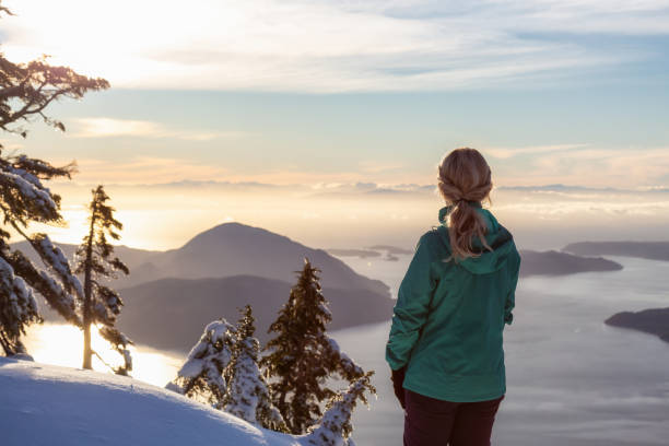 istock Girl on top of a mountain 1126513878