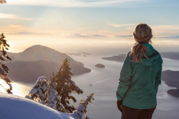 istock Girl on top of a mountain 1126514404