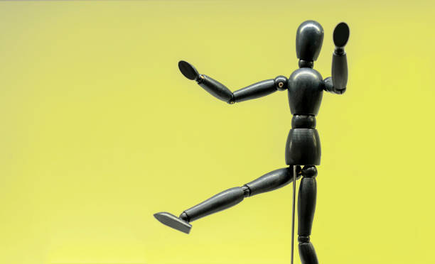 istock Wooden doll of a gestalta with various poses. 1126516973