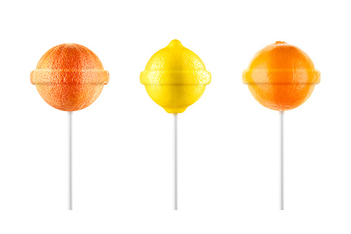 Lollipops. Lemon, grapefruit, orange set isolated on white background. Creative candy idea