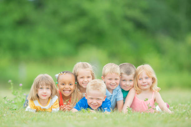 istock Kids Laying Together 1126518070